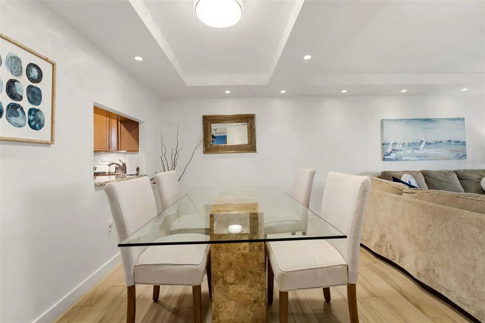 Inviting dining space with elegant details and coastal views.