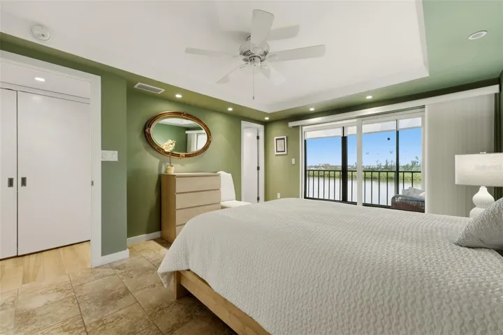 Relaxing primary retreat with generous closet space.