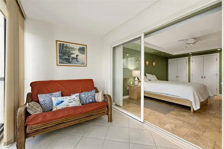 Inviting lanai seating for relaxing and enjoying the coastal setting.