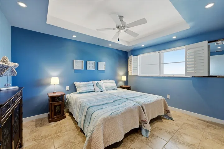 Serene guest bedroom with coastal-inspired blue tones.