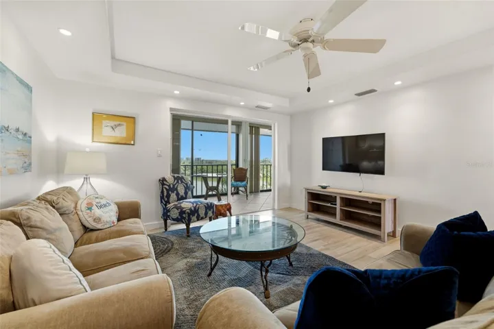 Inviting living space with abundant natural light and coastal views.