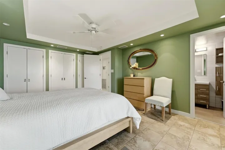 Primary bedroom with elegant details and a bright, airy feel.