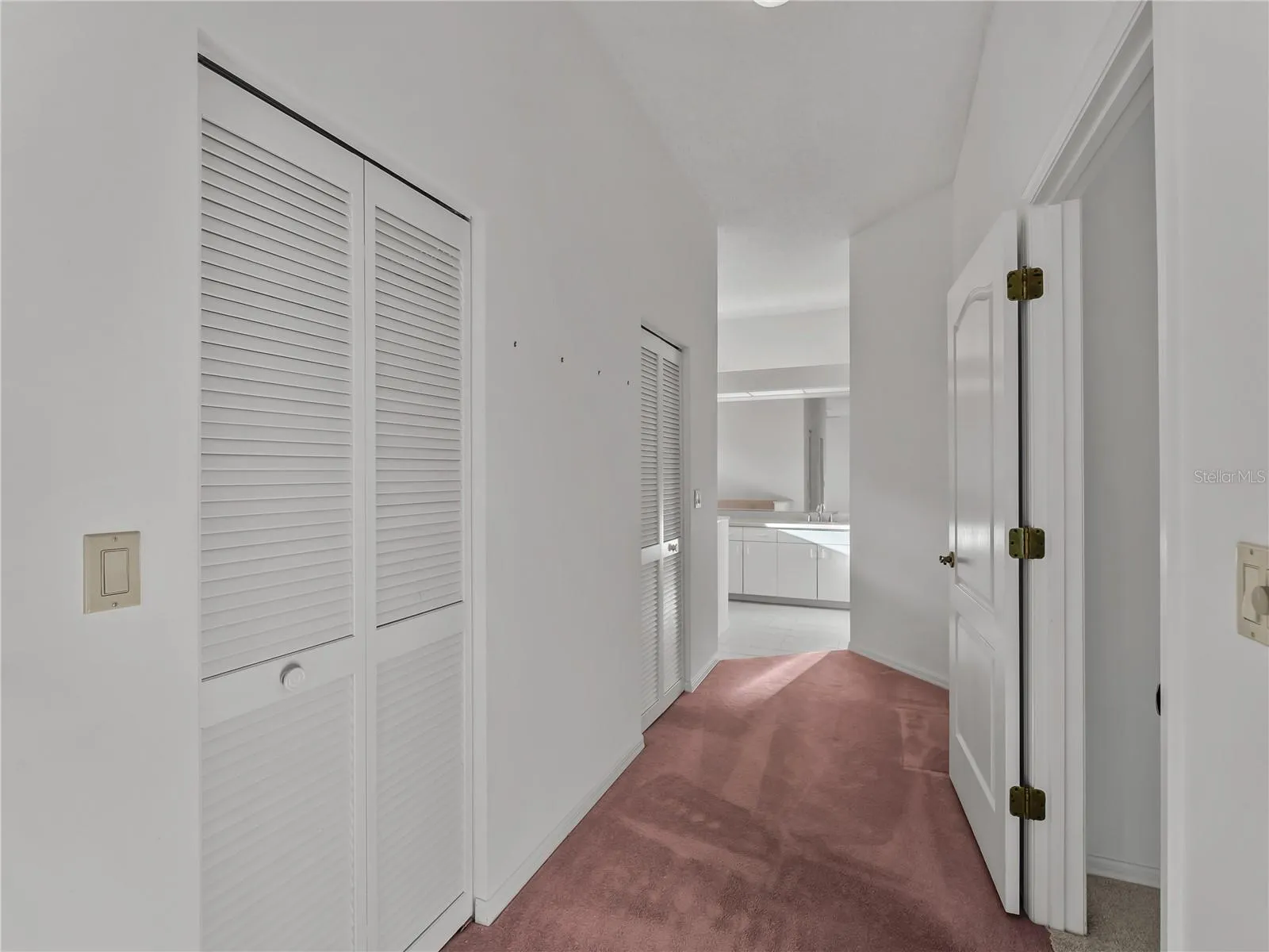 Hallway to Primary Ensuite bathroom