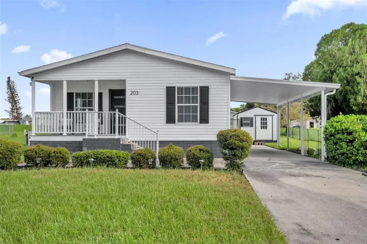 Exterior Front with Carport &amp; Front Porch