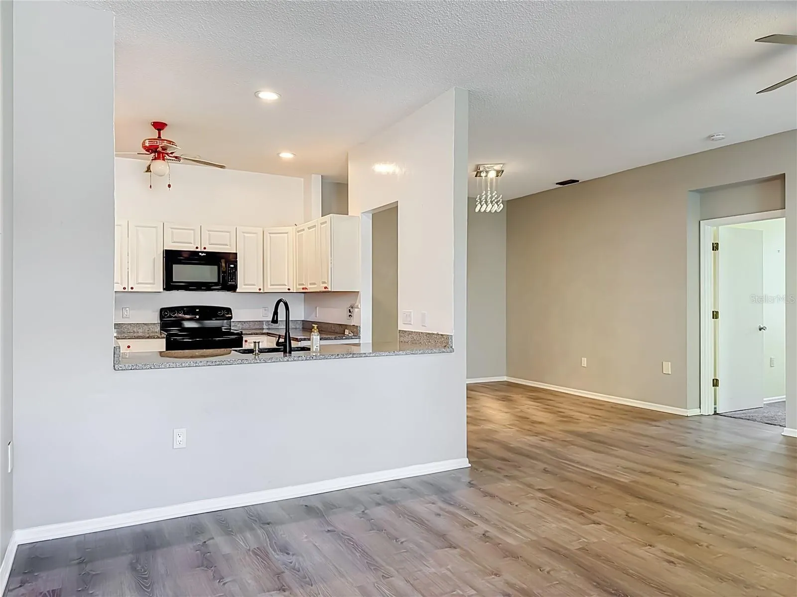 Great room looking into kitchen.