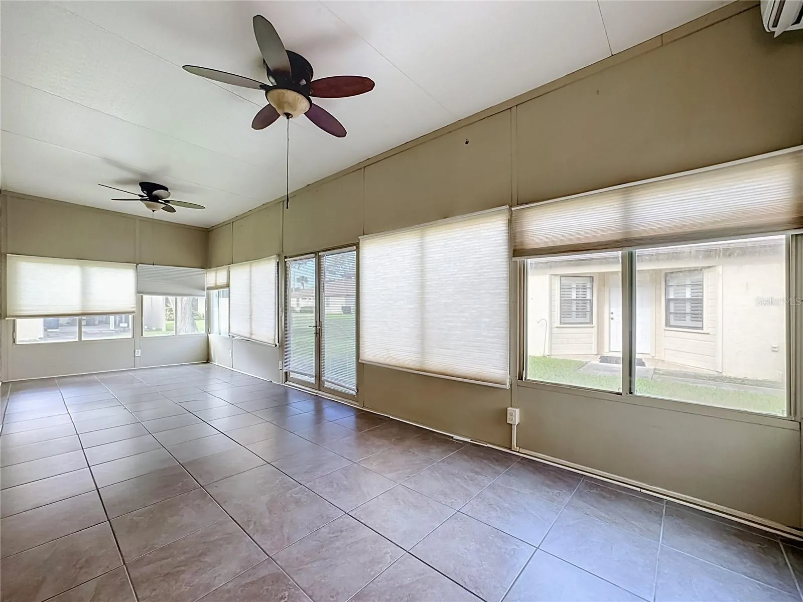 Two ceiling fans and the mini split AC offer lots of comfort for this flex room.