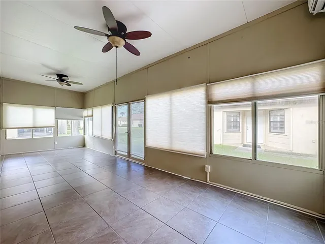 Two ceiling fans and the mini split AC offer lots of comfort for this flex room.