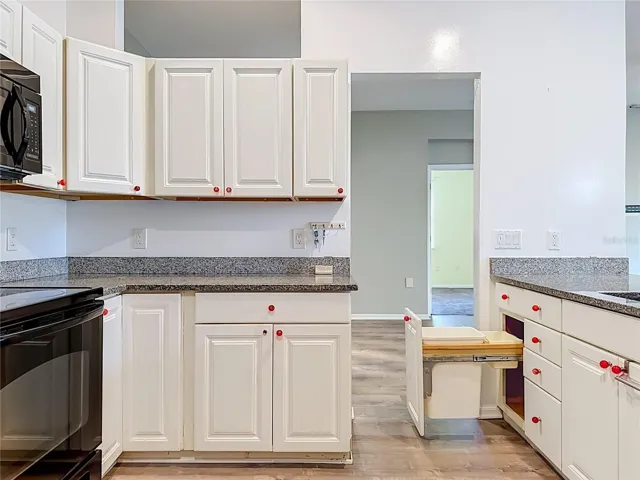 Garbage and recycle cabinet.