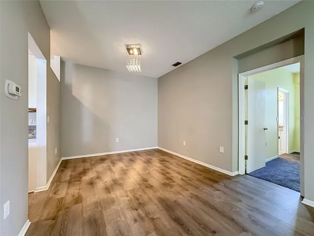 Dining room with updated light fixture.