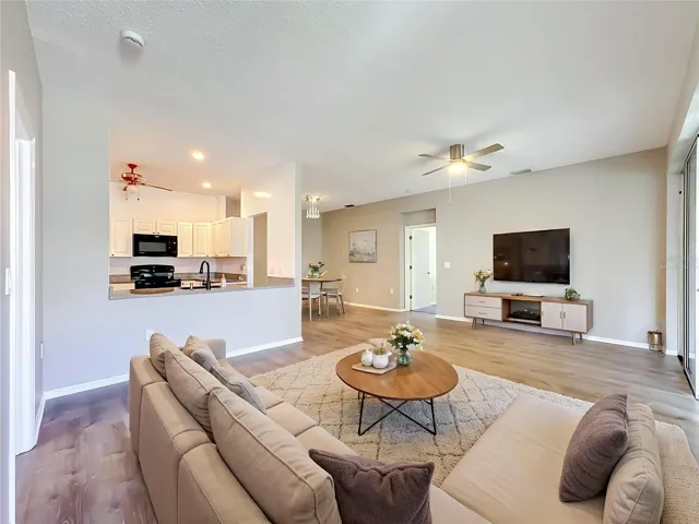Virtually staged great room.  Updated light fixtures in all rooms.