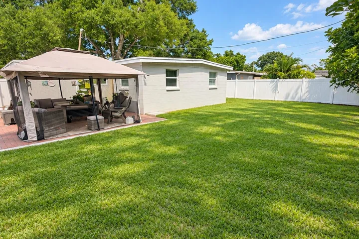 Spacious side yard provides added flexibility for your Florida lifestyle.