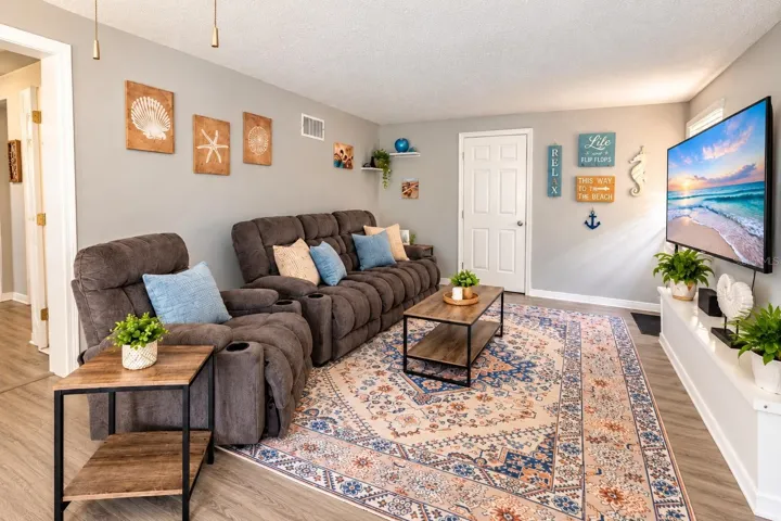 Huge family room offers flexible space for entertaining, relaxing or a home office.