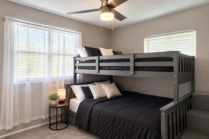 Bedroom 2 — light, bright and freshly refreshed with new carpet.