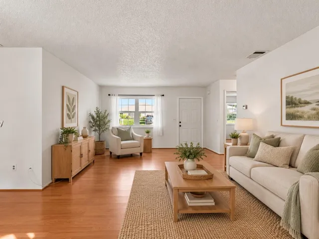 (Edited) LivingRoom_18103WindsweptAvenue_PortCharlotte_OpenConcept_Corner.jpg