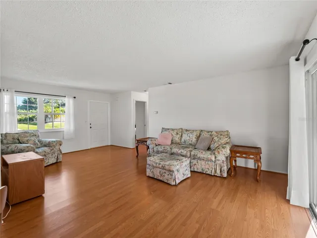 LivingRoom_18103WindsweptAvenue_PortCharlotte_NaturalLight_WindowView.jpg