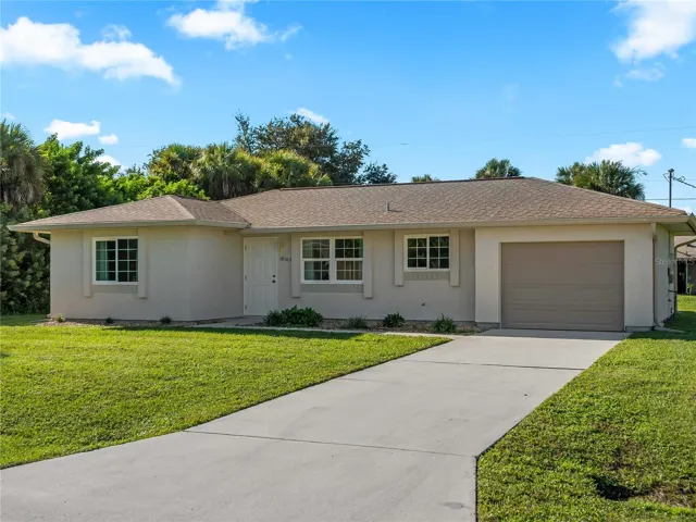 FrontExterior_18103WindsweptAvenue_PortCharlotte_TwoCarGarage_Entry.jpg