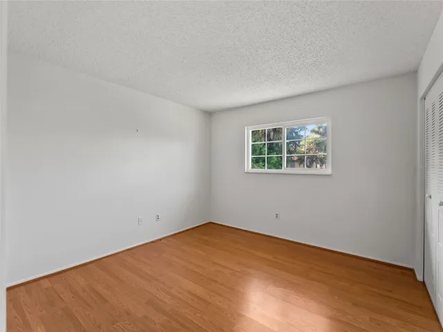 Bedroom_18103WindsweptAvenue_PortCharlotte_NaturalLight_Corner.jpg