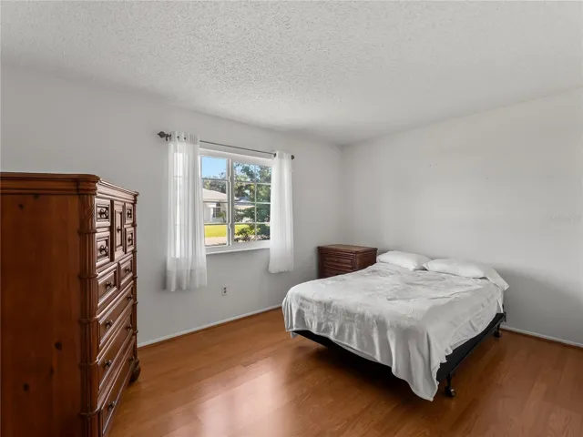 Bedroom_18103WindsweptAvenue_PortCharlotte_NaturalLight_WindowView.jpg