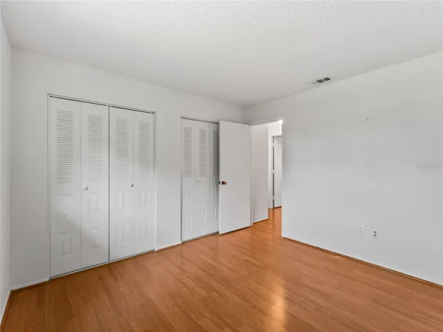 Bedroom_18103WindsweptAvenue_PortCharlotte_Closet_Corner.jpg