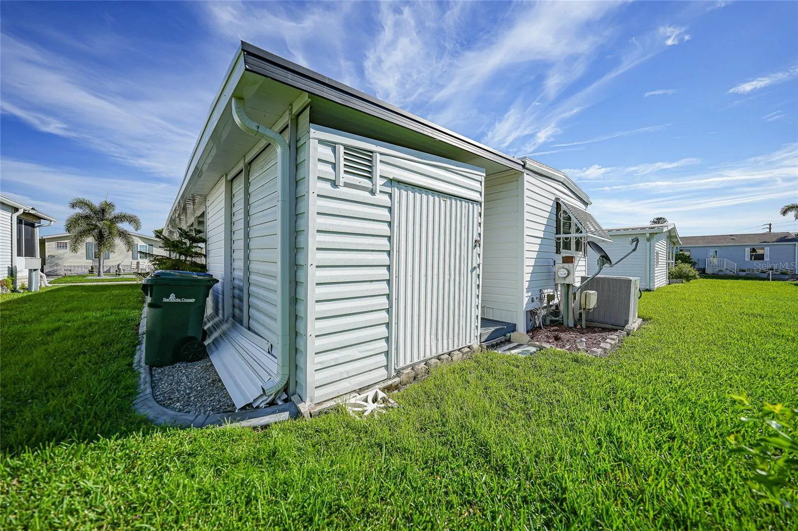Back of Home with additional Shed
