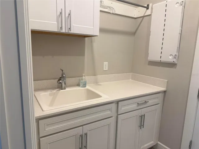 Laundry Tub and Cabinets