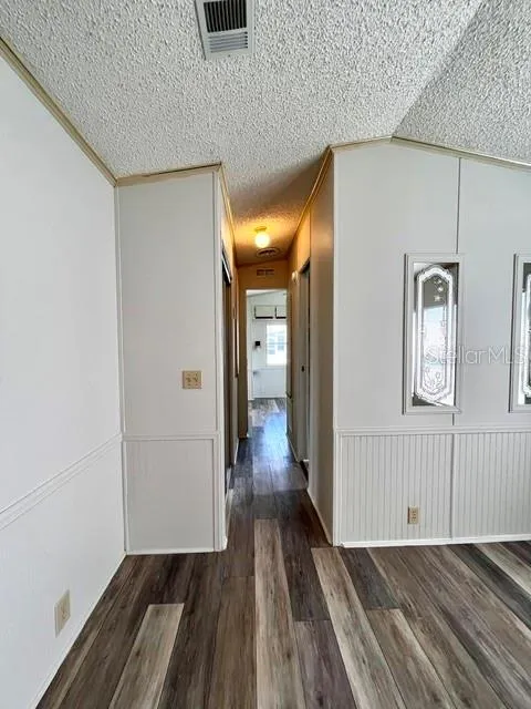 Hallway to bed and bath