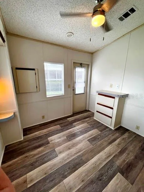 Bedroom - View to private entry and built-in dresser