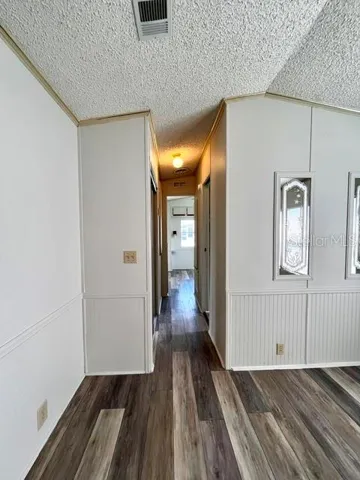 Hallway to bed and bath
