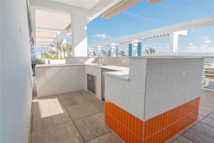 Rooftop bar with retractable canopy