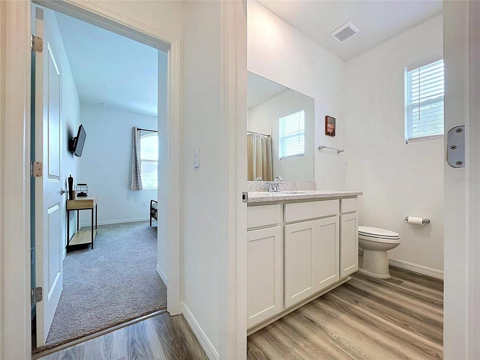 HALLWAY LEADING TO  FRONT BEDROOM &amp; GUEST BATH