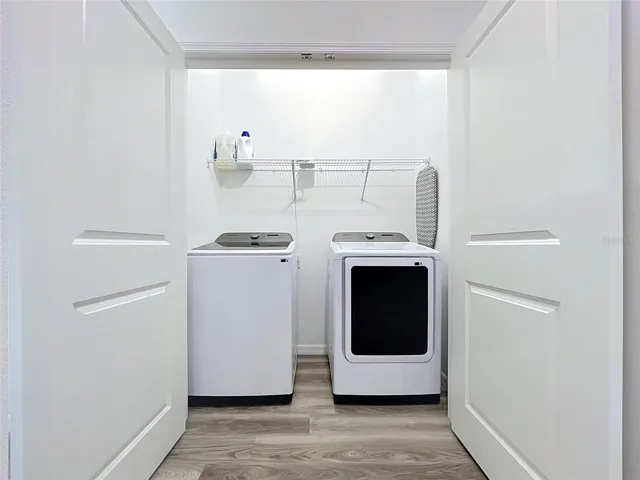 INSIDE CLOSET LAUNDRY AREA