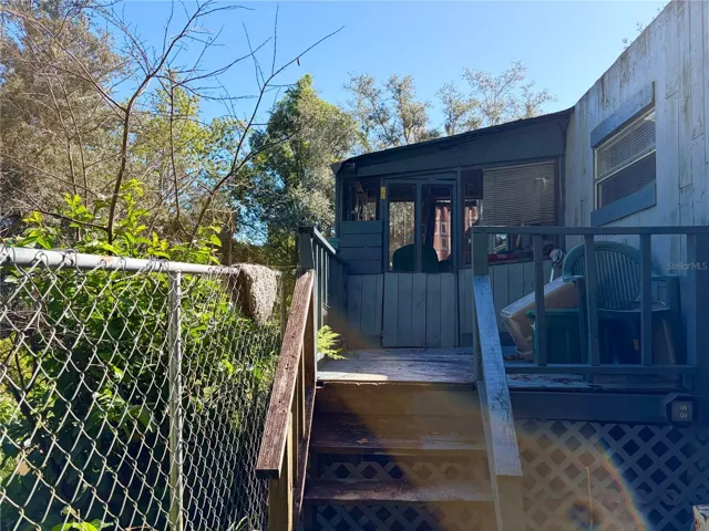 Steps down into backyard
