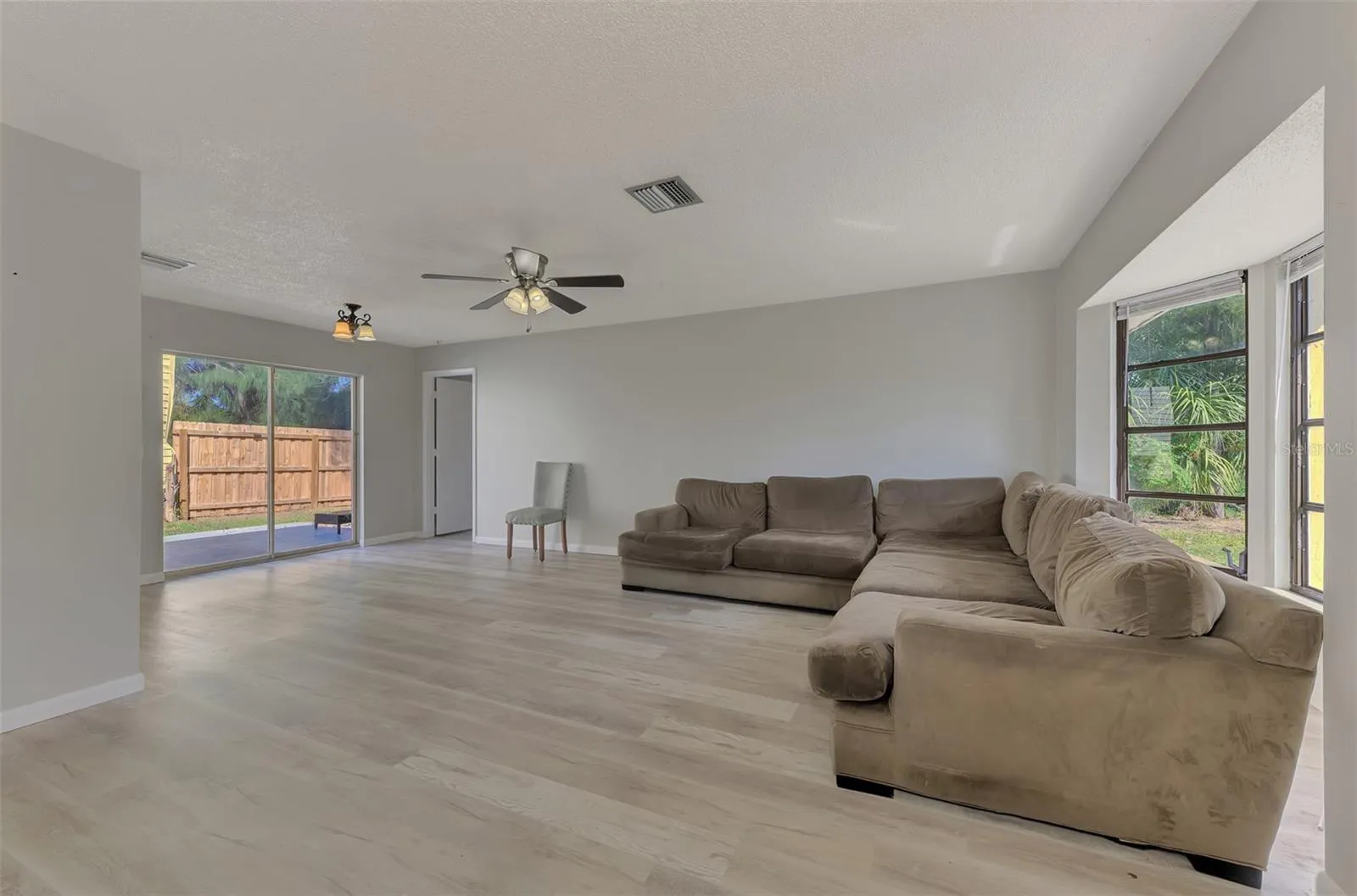 Living/dining Area with slider to back yard