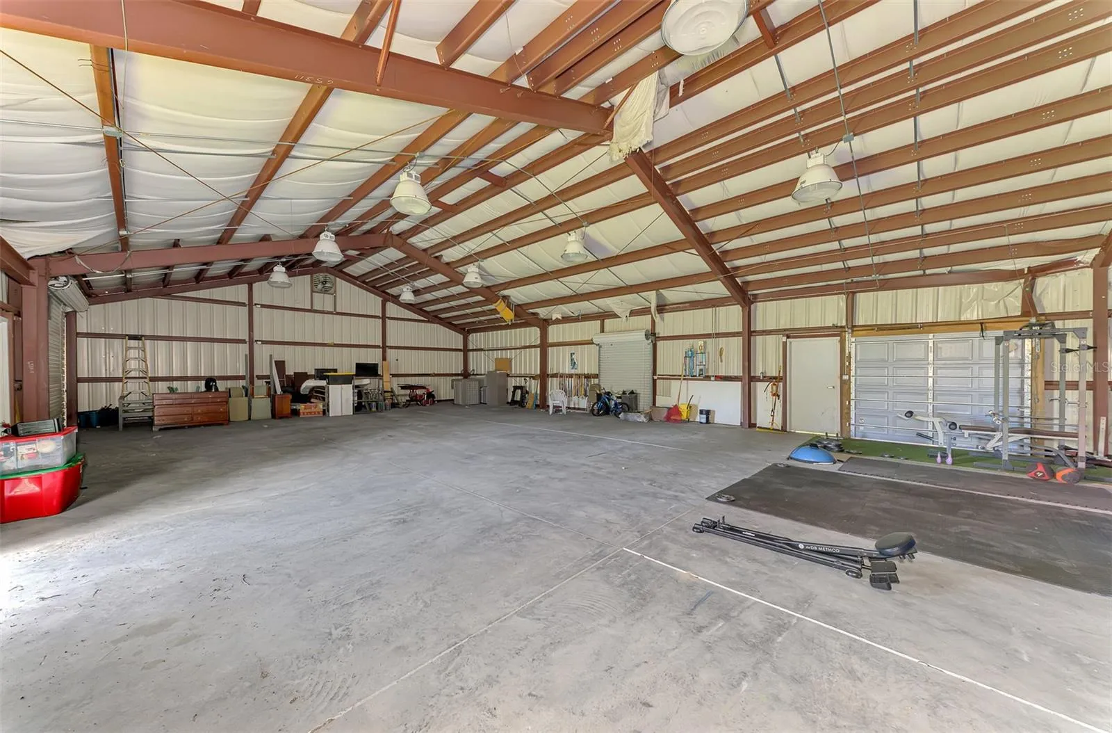 2400 sq ft garage/warehouse space, perfect for storing boats, recreational equipment, cars, or business inventory.