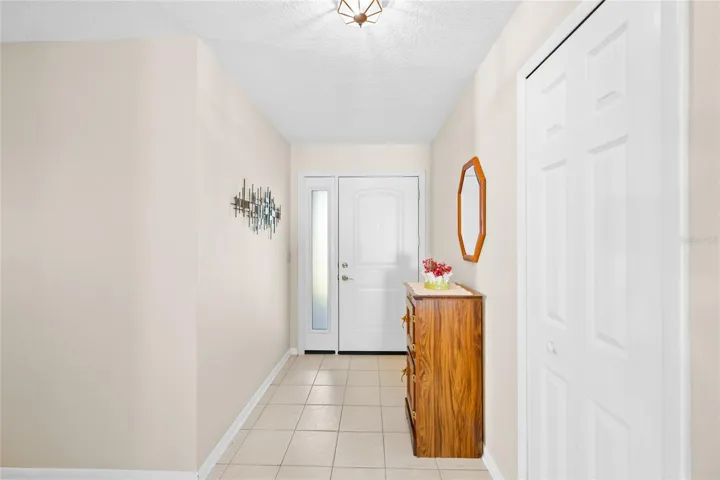 Foyer with coat/jacket closet.