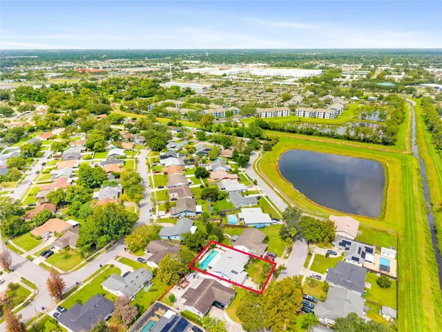 Aerial view of the neighborhood and retention pool