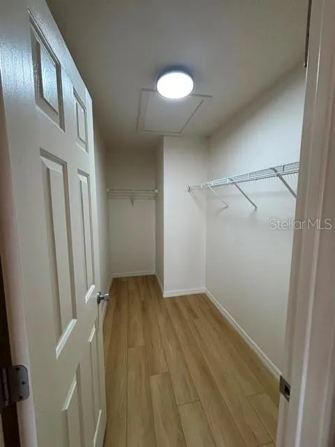 Primary bedroom large walk-in closet