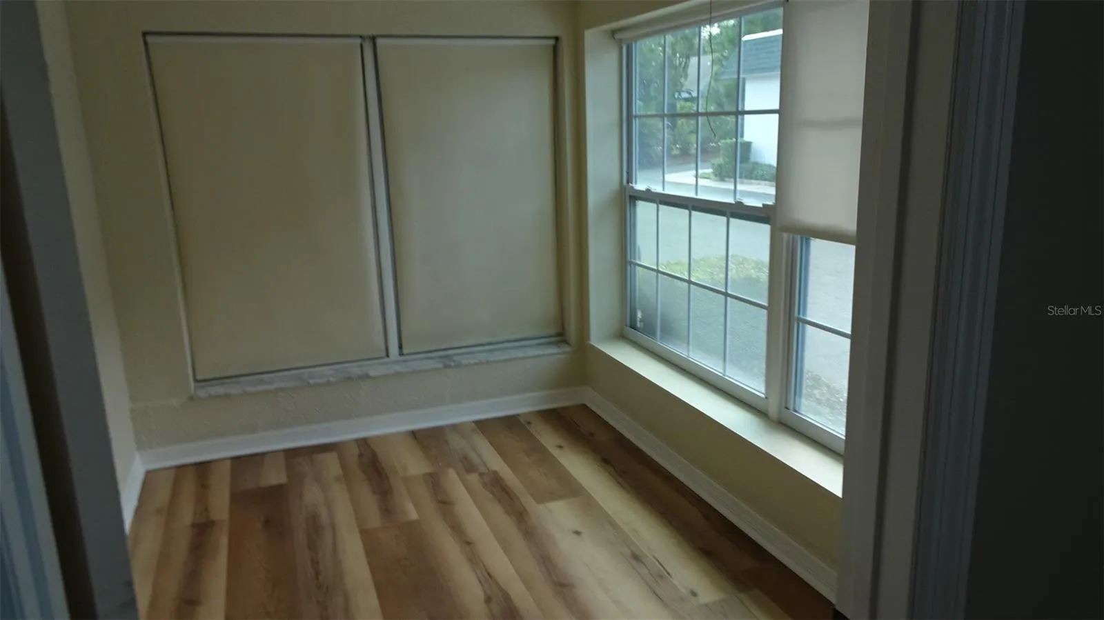 Front room facing south, den/office