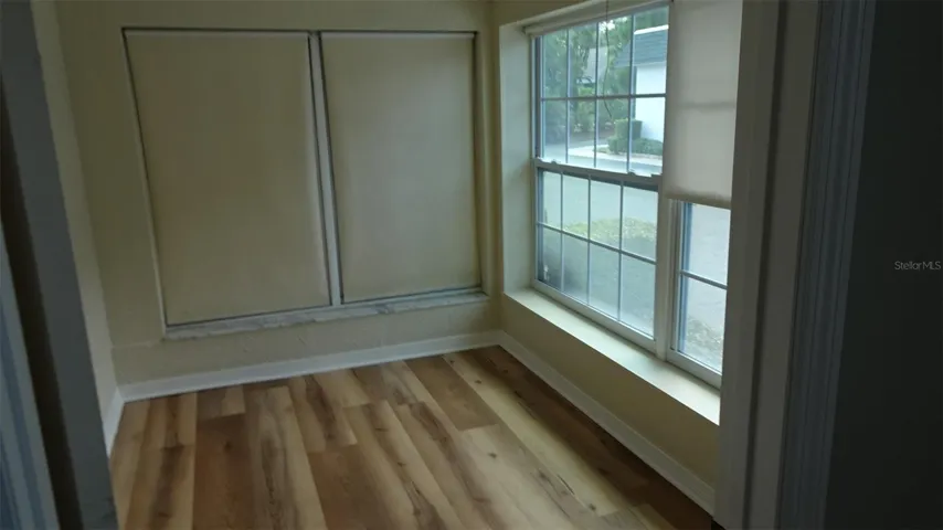 Front room facing south, den/office