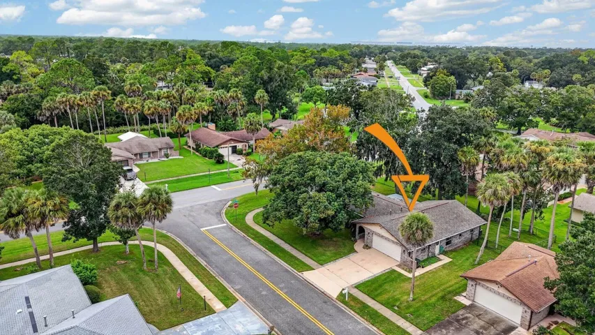 Aerial Neighborhood View with Property Location Marker