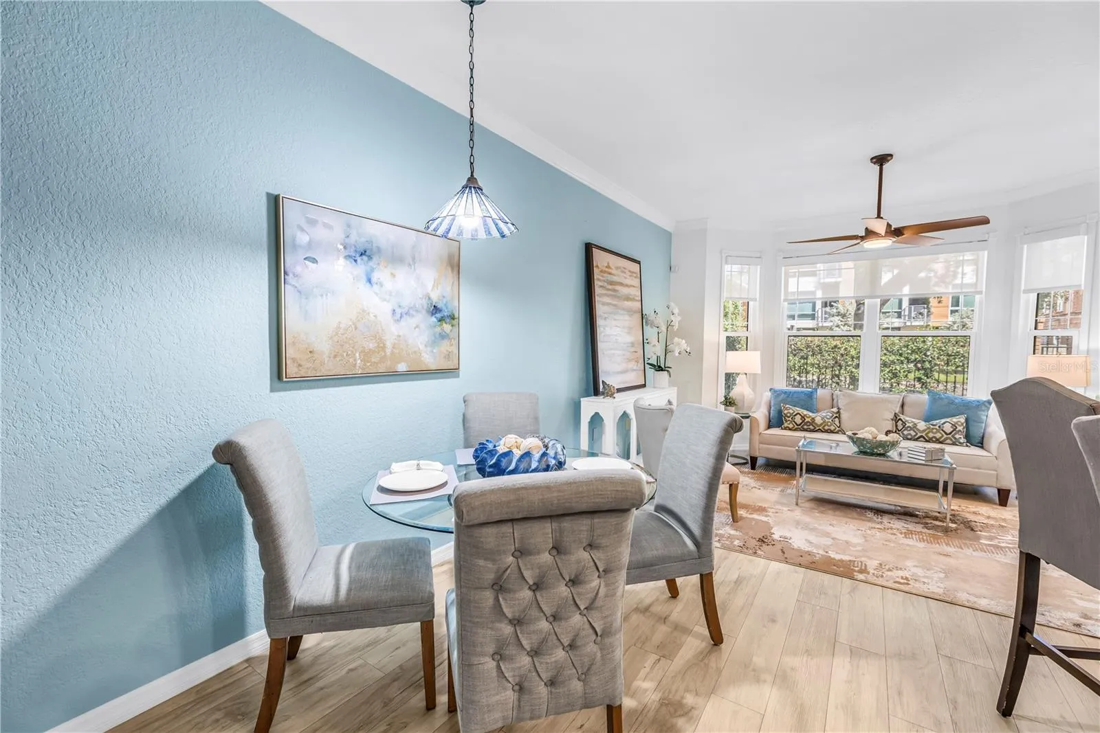 Open living and dining areas flow together comfortably, creating an inviting setting for everyday living and entertaining.