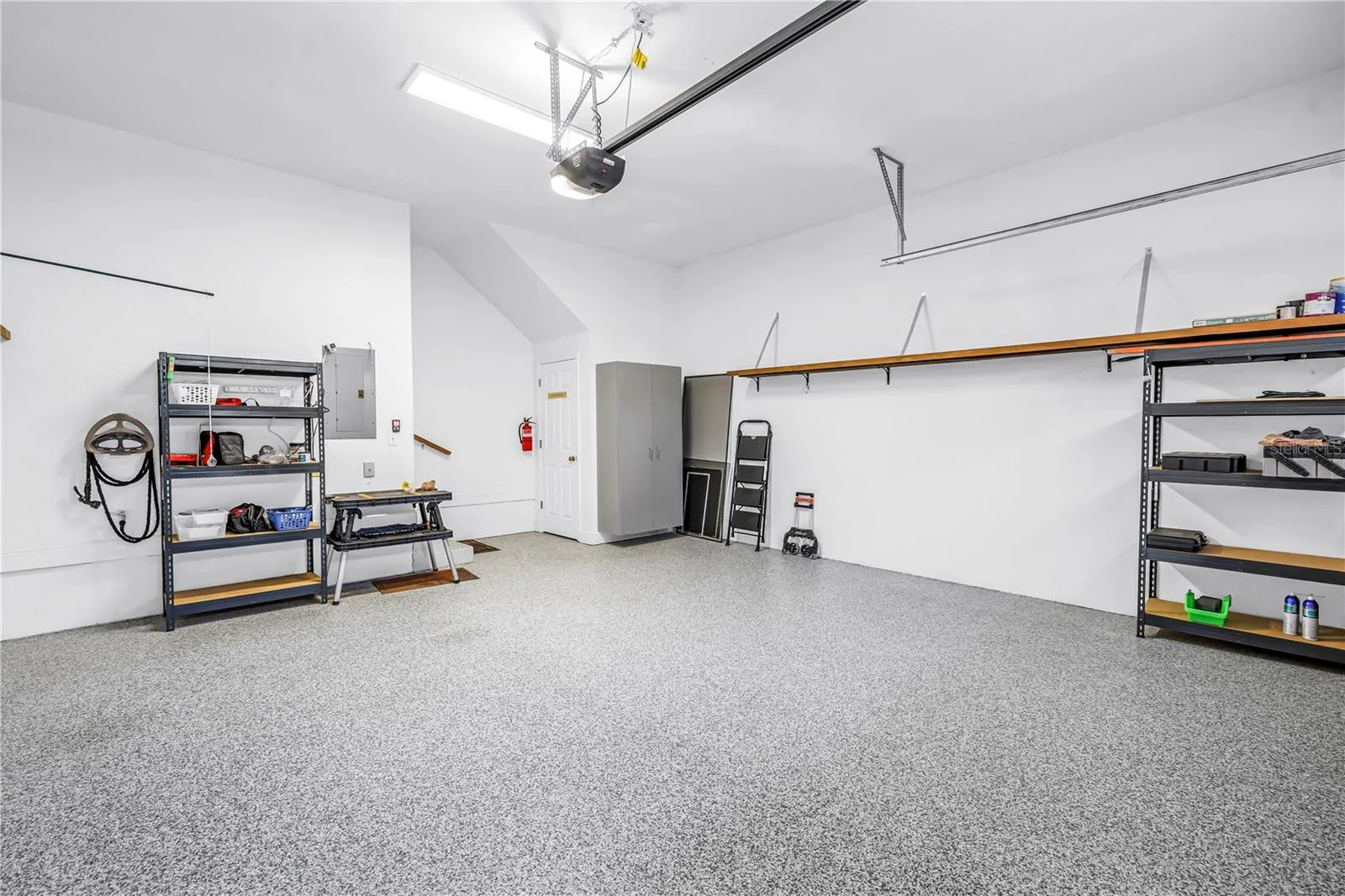 Garage with beautiful coated concrete floor