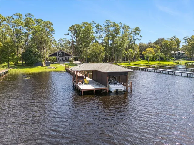 Dock features a functional boat lift.