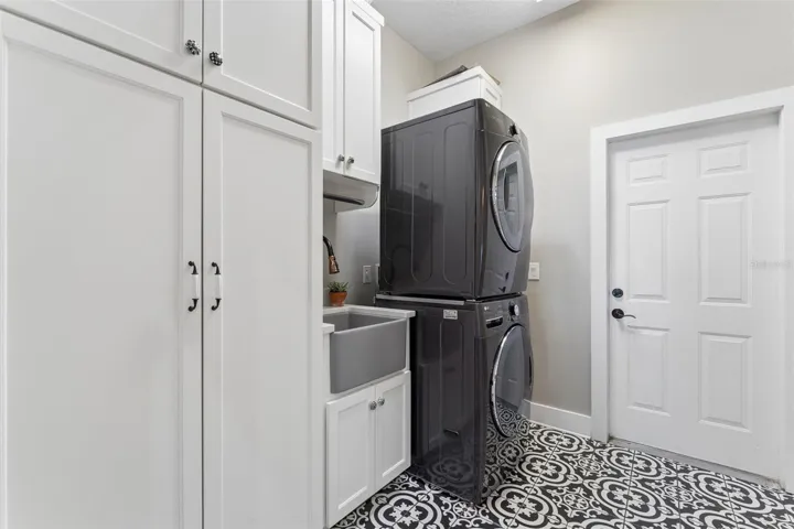Laundry room has tons of storage.