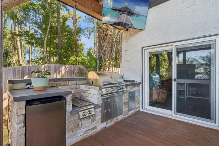 The office has sliding glass door access to the exterior.