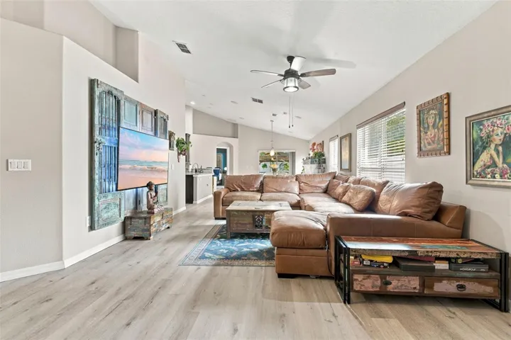 Main living area. Dining room and kitchen afar.