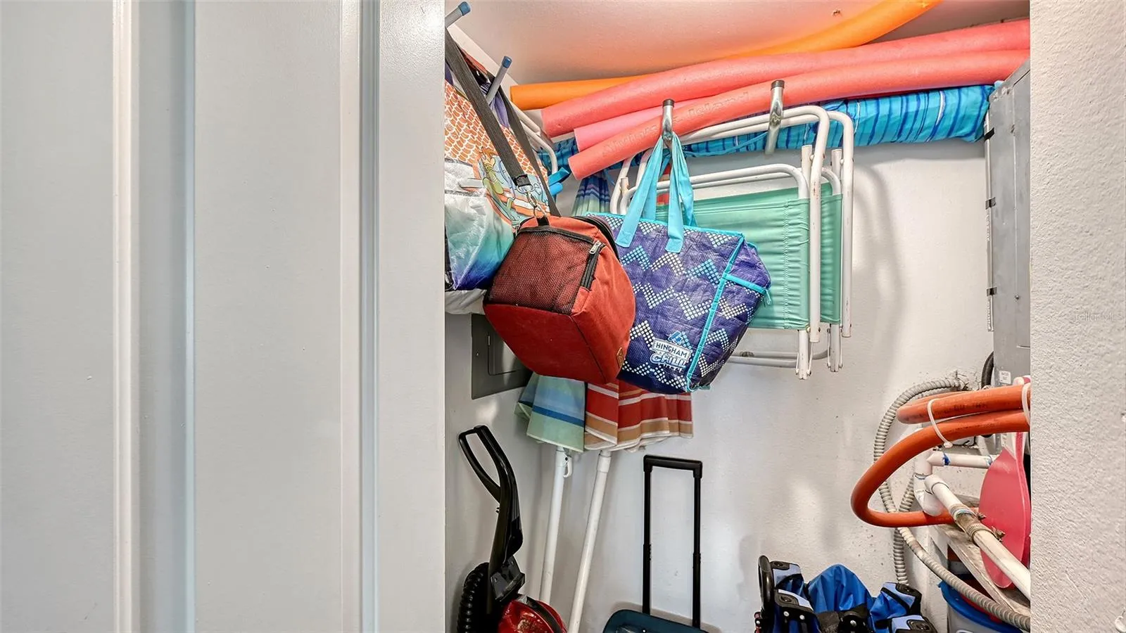 Storage closet in unit.  Unit also has additional storage bin in community storage area
