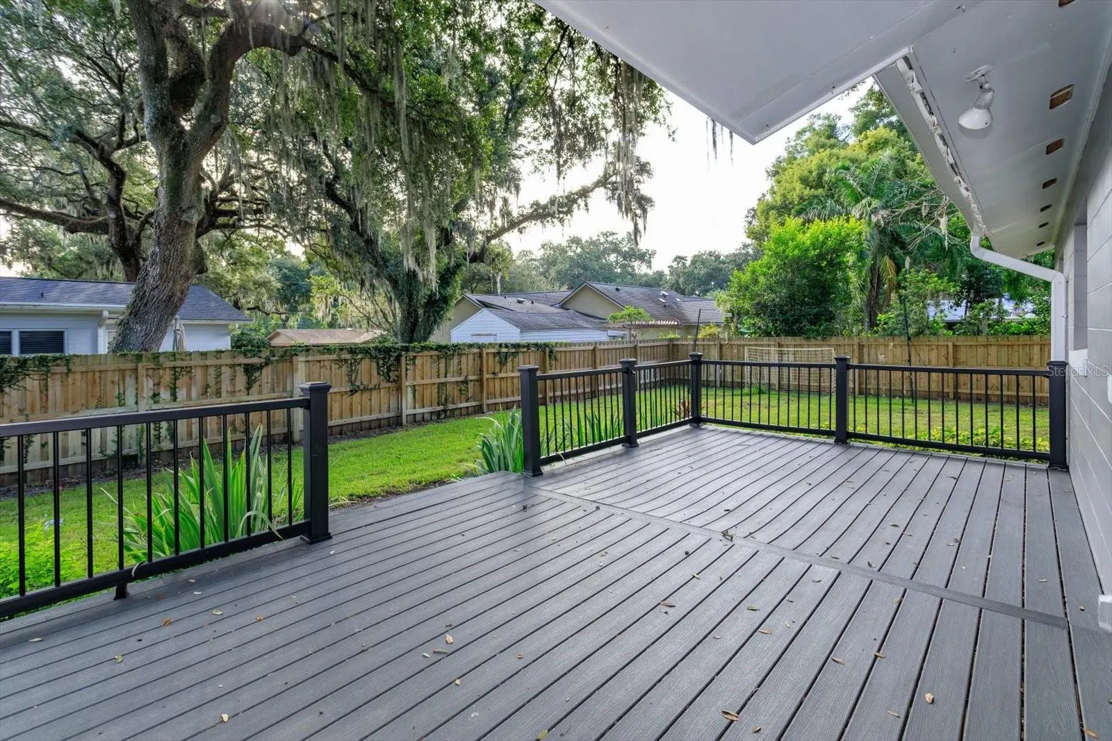 Rear deck overlooks the back yard