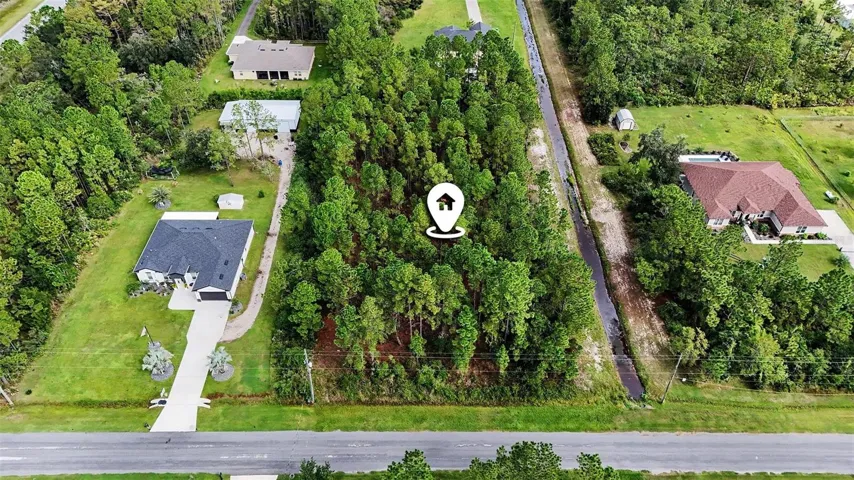 1.24 acre lot with 180-foot frontage!