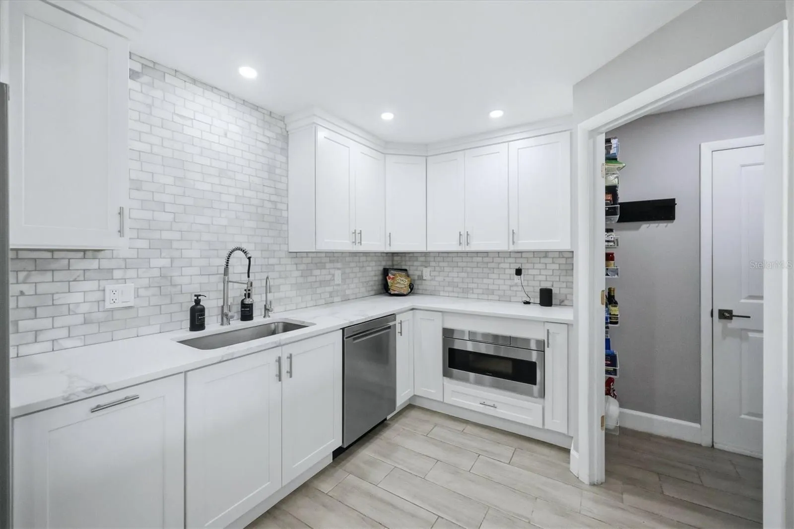 Kitchen/Pantry with entry to Garage